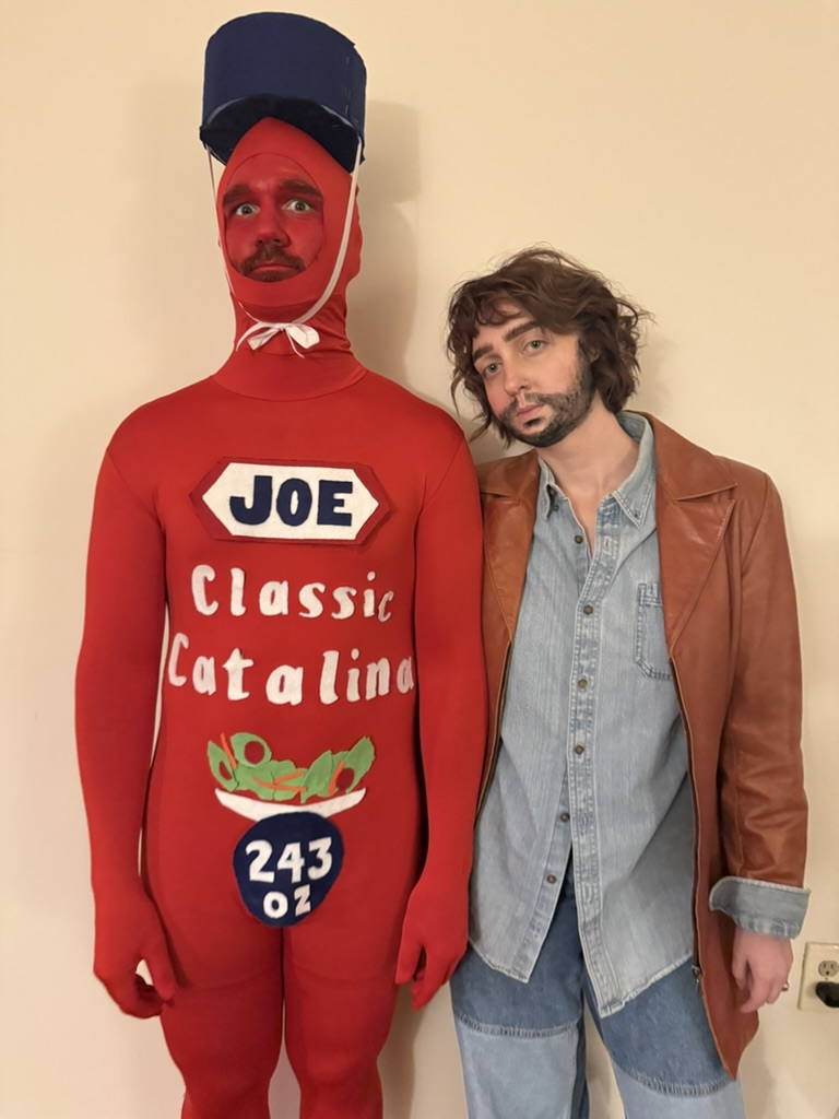 Caroline and Joe dressed up for halloween as catalina dressing and Cat Stevens