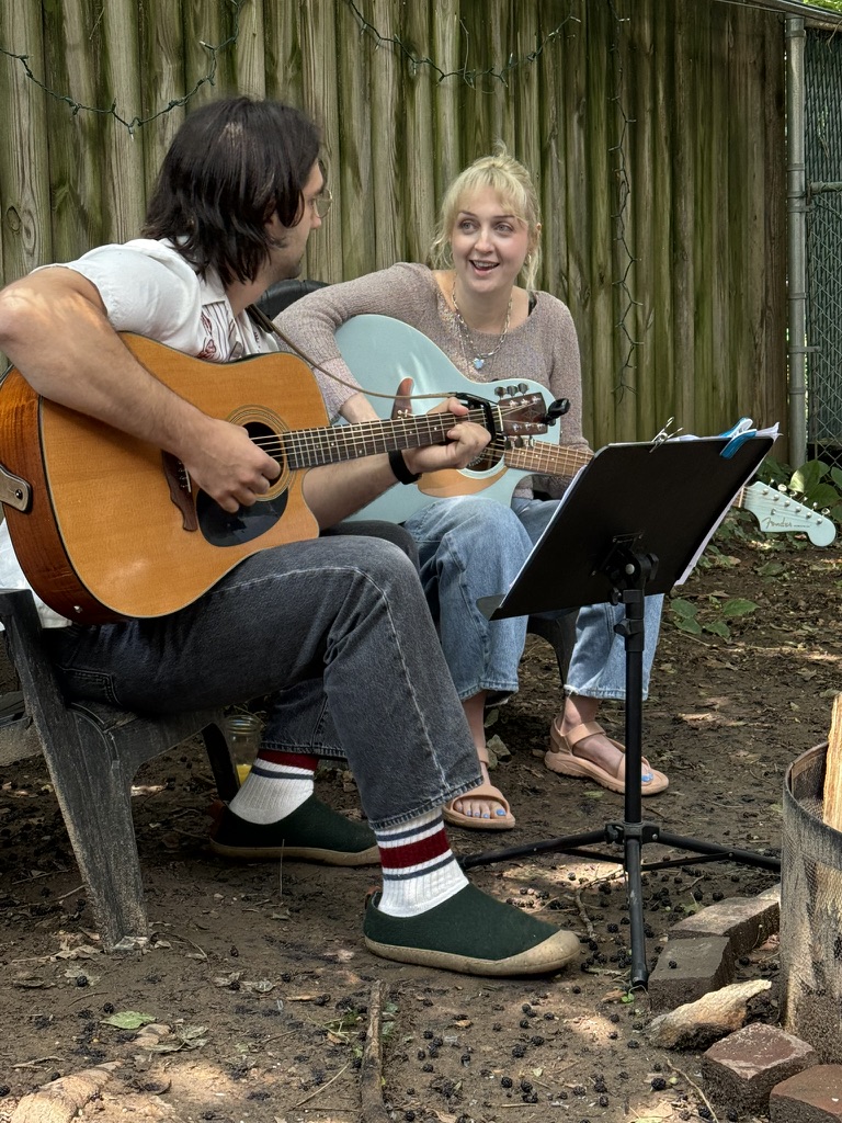 Caroline and Joe performing together at Porchfest